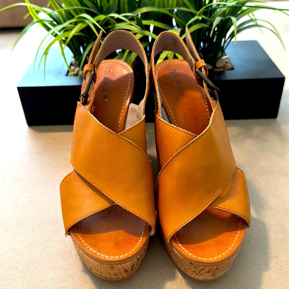 Super cute, lightweight, leather platform wedge sandals by Hinge!
